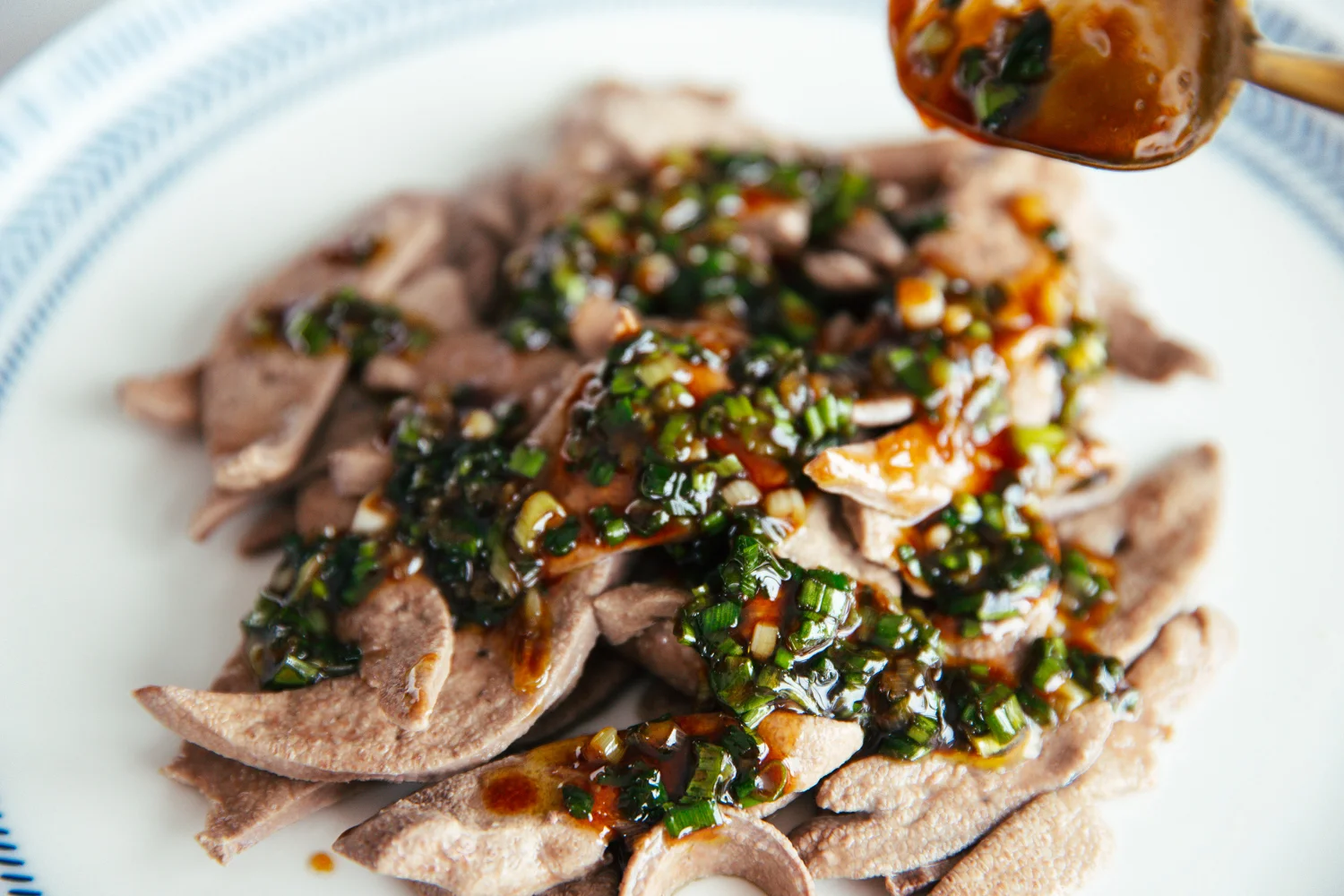 poached pork liver with scallion sauce